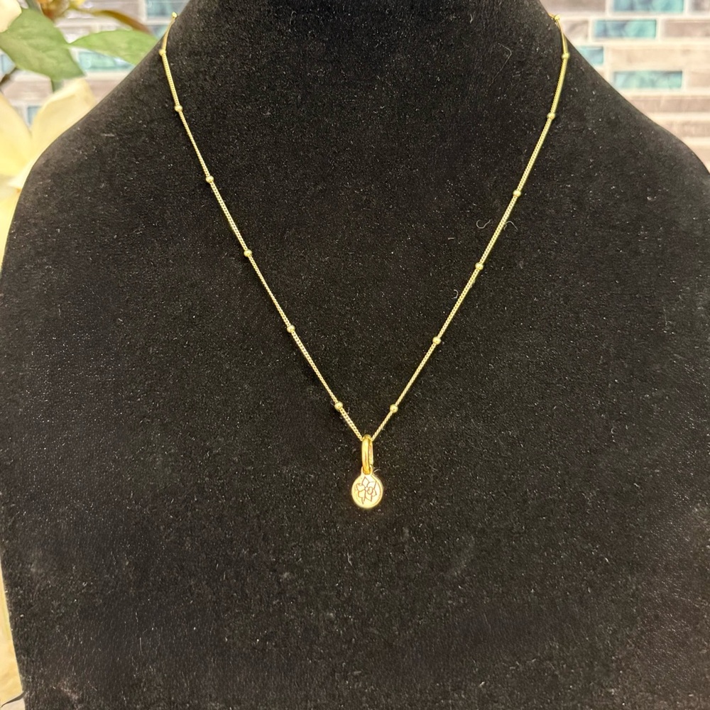 Rellery Saturn chain and Daffodil charm necklace